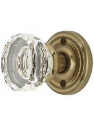 Classic Rosette Door Set with Lowell Crystal Glass Knobs in Antique Brass.